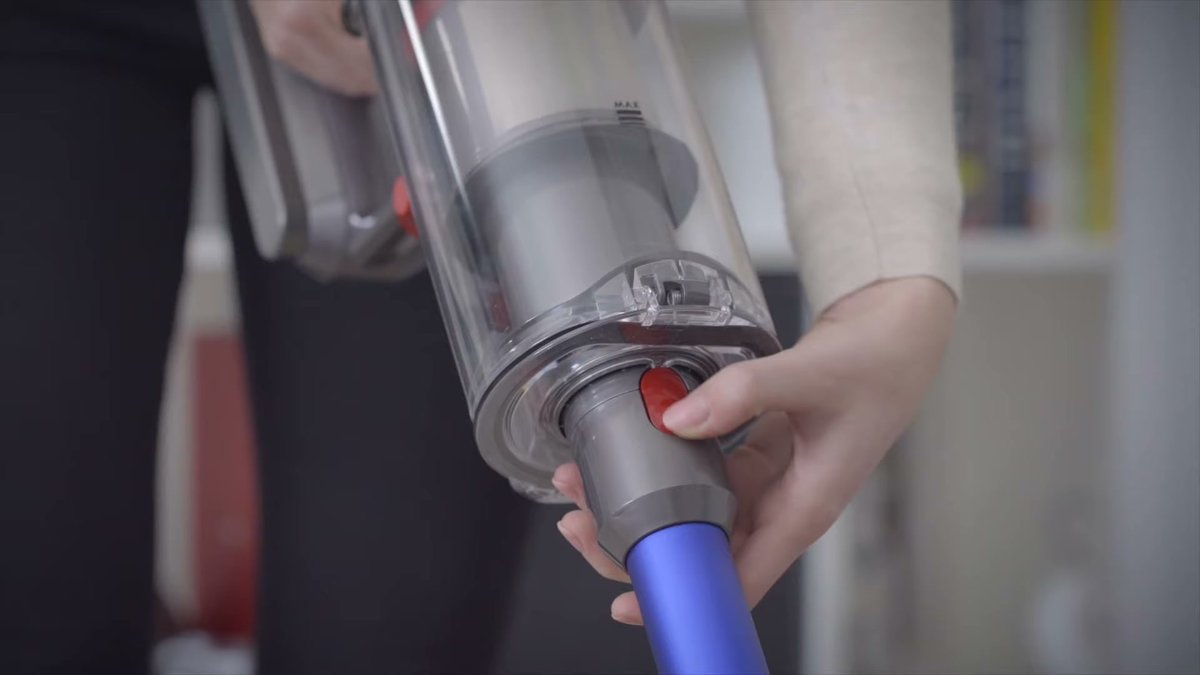Dyson V11 Replacement Battery being handled during bin emptying in home setting