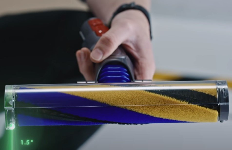Dyson V15 Detect laser illuminating dust on floor