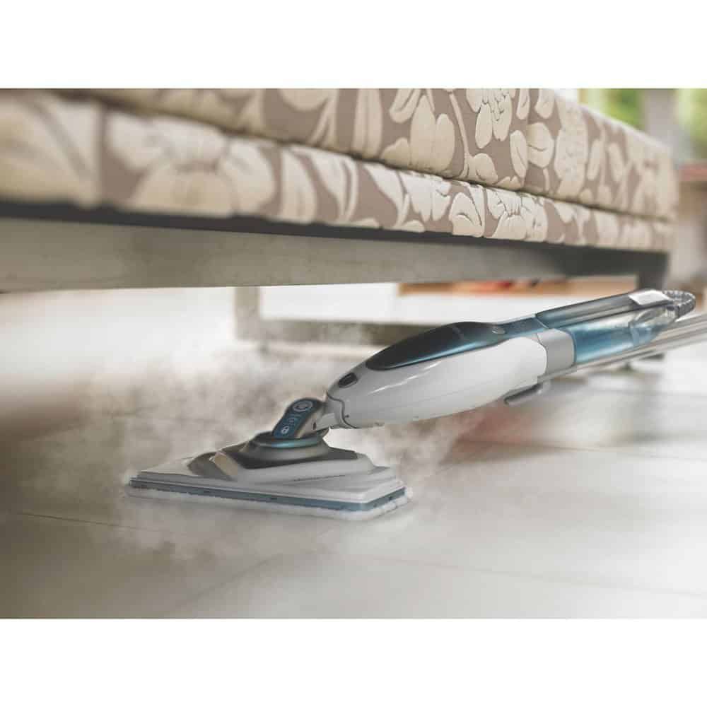 Steam cleaner being used on tile floor